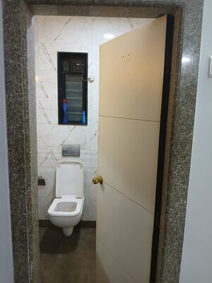 Bathroom in 1 BHK Apartment at Je And Vee Om Trimurti, Malad East – for Sale