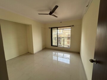 Room in 2 BHK Apartment at Raunak Unnathi Woods Phase 6, Ghodbunder Road – for Sale