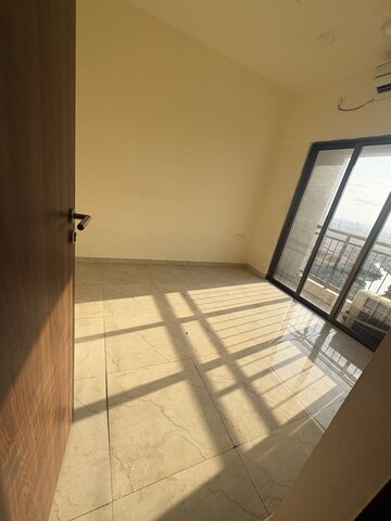 Room in 2 BHK Apartment at Sunteck West World, Tivri – for Rent