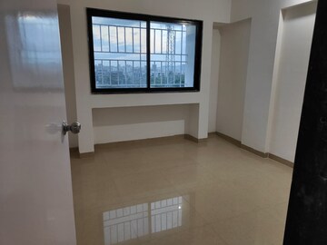 Room in 2 BHK Apartment at Ganesh Nabhangan, Dhayari – for Sale