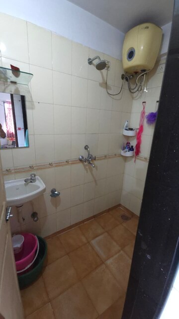 Bathroom in 1 BHK Apartment at Dindoshi Onkar CHS, Malad East – for Rent