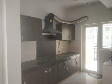 Kitchen in 3 BHK Apartment at Paramount Floraville, Sector 137 – for Rent