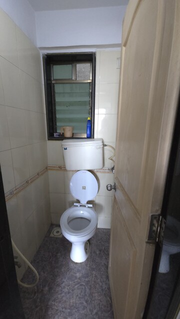Bathroom in 1 BHK Apartment at Dindoshi Onkar CHS, Malad East – for Rent