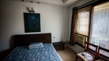 Bedroom in 3 BHK Builder Floor at Chittaranjan Park – for Rent