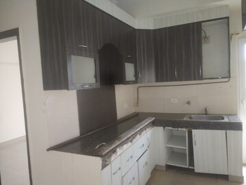 Kitchen in 3 BHK Apartment at Paramount Floraville, Sector 137 – for Sale
