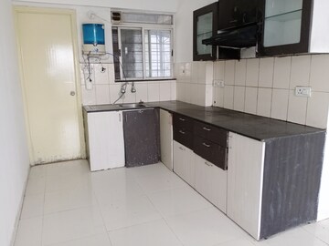 Kitchen in 2 BHK Apartment at Omega Heritage, Dhayari – for Sale