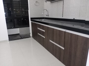 Kitchen in 2 BHK Apartment at Pinnacle Cottage Close, Sinhagad Road – for Sale