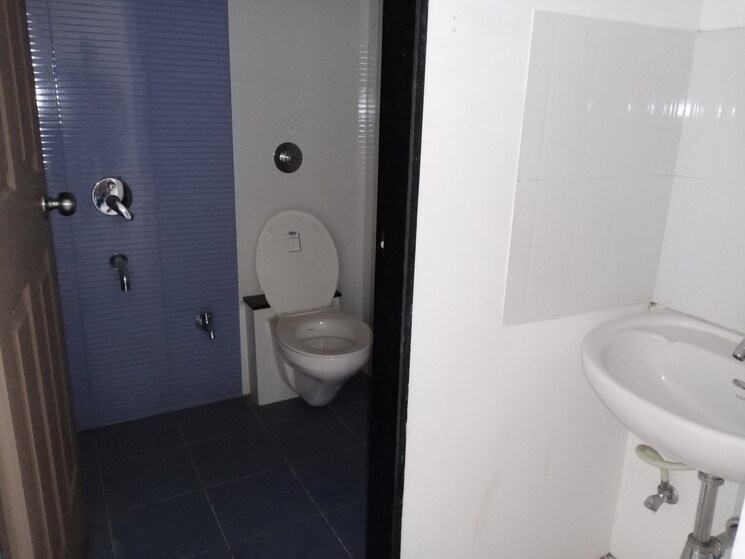 Bathroom, tejas-pooja-poorva-shrushti 2 Bedroom 900 Sq.Ft. Apartment In Nanded Pune 9149576