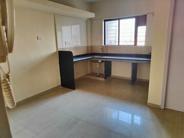 Kitchen in 1 BHK Apartment at Rose Wood Apartment, Dhayari – for Sale