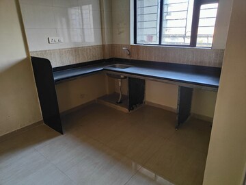 Kitchen in 1 BHK Apartment at Rose Wood Apartment, Dhayari – for Sale