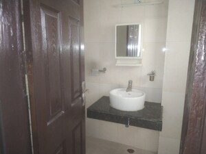 Bathroom in 2 BHK Apartment at Paramount Floraville, Sector 137 – for Sale
