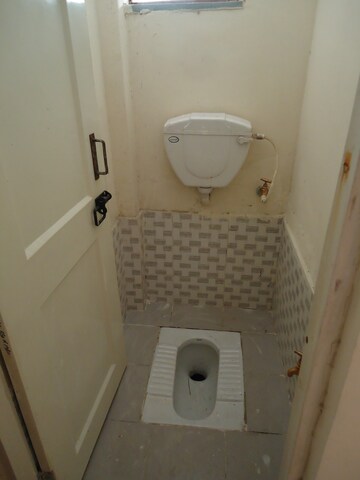 Bathroom in 1 BHK Apartment at Manokamna Apartments Rohini, Rohini Sector 34 – for Sale