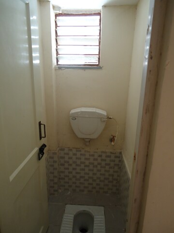 Bathroom in 1 BHK Apartment at Manokamna Apartments Rohini, Rohini Sector 34 – for Sale