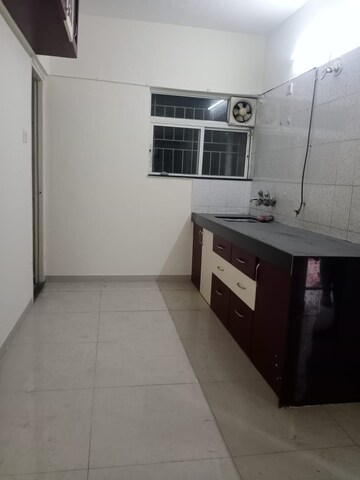 Kitchen in 1.5 BHK Apartment at Shriniwas Serene County, Nanded – for Sale