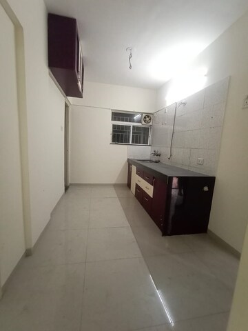 Kitchen in 1.5 BHK Apartment at Shriniwas Serene County, Nanded – for Sale