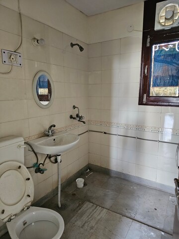 Bathroom in 3 BHK Apartment at Sector 19b Dwarka – for Rent