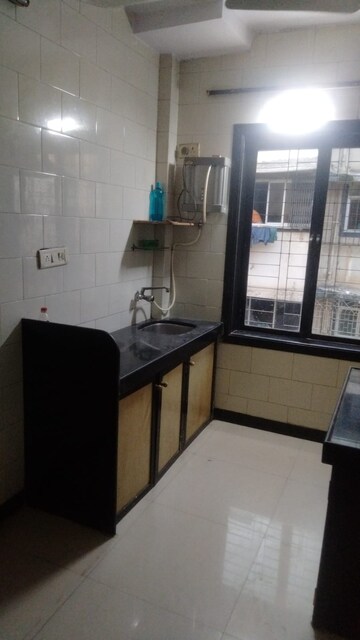 Kitchen in 1 BHK Apartment at Vijaynagar Society, Marol – for Rent