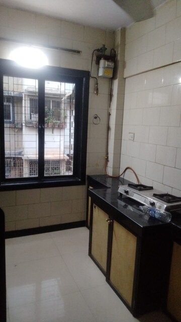 Kitchen in 1 BHK Apartment at Vijaynagar Society, Marol – for Rent