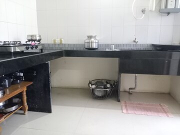 Kitchen in 2 BHK Apartment at Tarangan Residency, Dhayari – for Sale