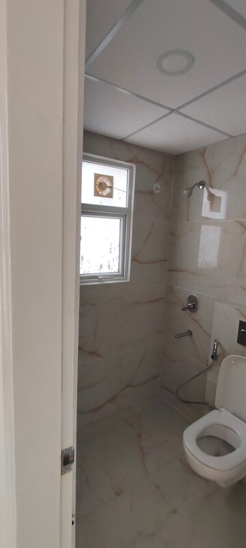 Bathroom in 3 BHK Apartment at Omaxe The Palace, Gomti Nagar – for Rent