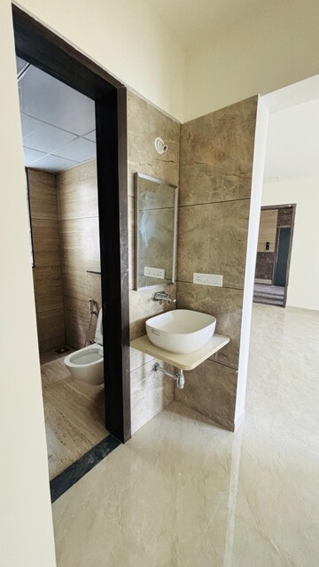 Bathroom in 3 BHK Apartment at Rama Celestial City Phase II, Ravet – for Rent
