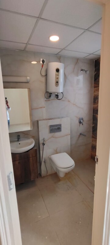 Bathroom in 3 BHK Apartment at Omaxe The Palace, Gomti Nagar – for Rent