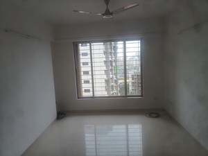Room in 2 BHK Apartment at Sadguru Towers, Goregaon East – for Sale