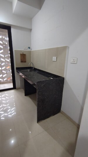 Kitchen in 2 BHK Apartment at Lodha Downtown, Dombivli East – for Sale