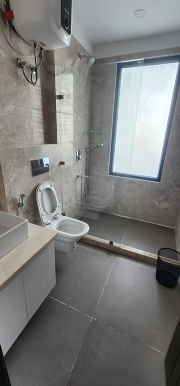 Bathroom in 3 BHK Apartment at Shapoorji Pallonji Joyville Phase 2, Sector 102 – for Rent