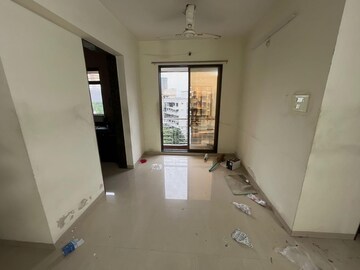 Living Room in 2 BHK Apartment at Swastik Windsor Heights, Kharghar – for Rent