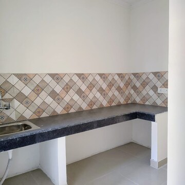 Kitchen in 1 BHK Apartment at Nilaya Greens, Sikrod – for Sale