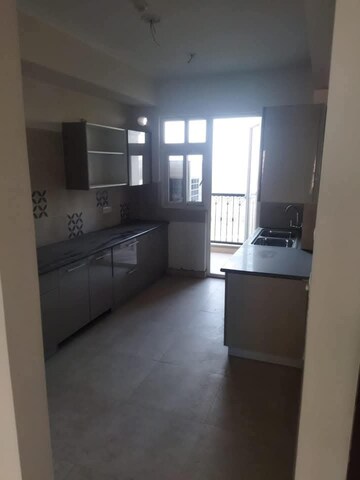 Kitchen in 3.5 BHK Apartment at ATS Triumph, Sector 104 – for Sale