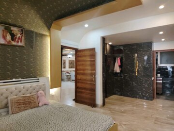 Bedroom in 4 BHK Apartment at Dhoot Time Residency, Sector 63 – for Rent