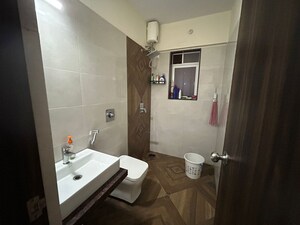 Bathroom in 2 BHK Apartment at Puranik Hometown, Ghodbunder Road – for Sale