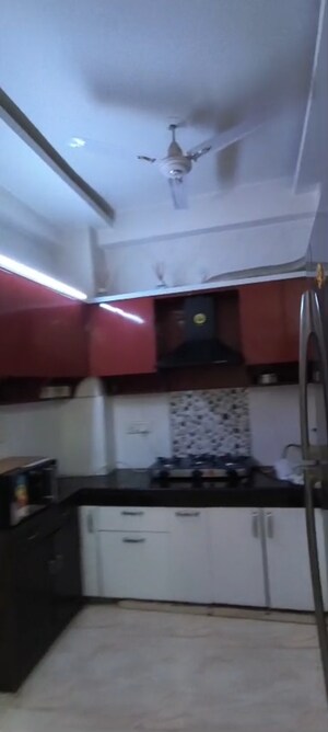 Kitchen in 3 BHK Builder Floor at Shakti Khand 2 – for Sale