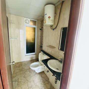 Bathroom in 3 BHK Apartment at Mahagun Mirabella, Sector 79 – for Rent