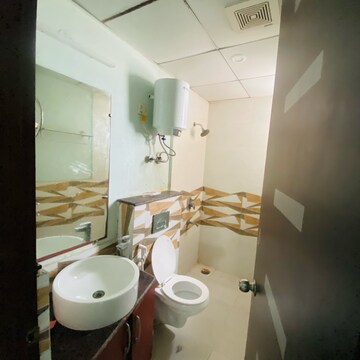 Bathroom in 3 BHK Apartment at Gaur Sportswood, Sector 79 – for Rent