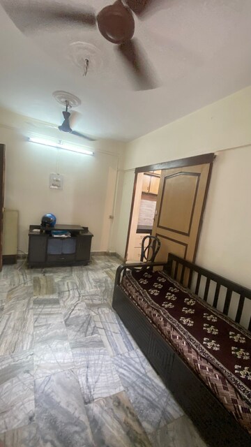 Living Room in 1 BHK Apartment at Satya Shreepal Nagar CHS, Kandivali West – for Rent