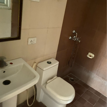 Bathroom in 2 BHK Apartment at Aims Golf Avenue II, Sector 75 – for Rent