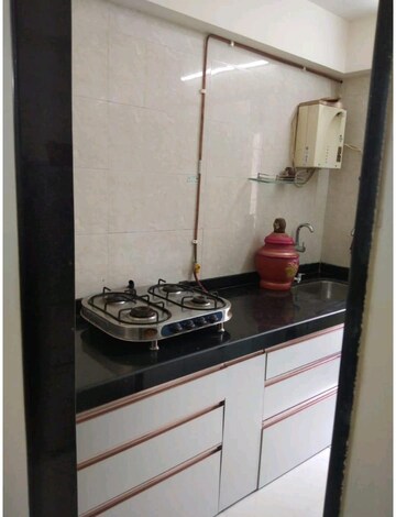 Kitchen in 2 BHK Apartment at RDC Pinewood, Thane West – for Sale