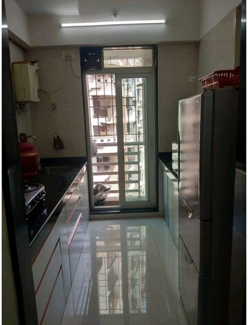 Kitchen in 2 BHK Apartment at RDC Pinewood, Thane West – for Sale