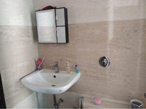 Bathroom in 2 BHK Apartment at RDC Pinewood, Thane West – for Sale