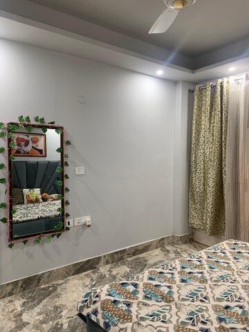 Bedroom in 3 BHK Builder Floor at Freedom Fighters Enclave – for Rent
