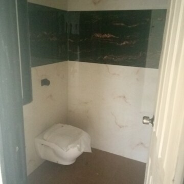 Bathroom in 2 BHK Apartment at Unnat Nagar CHS, Goregaon West – for Rent