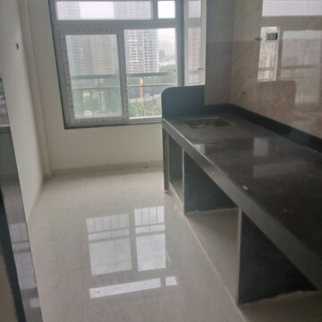 Kitchen in 2 BHK Apartment at Unnat Nagar CHS, Goregaon West – for Rent