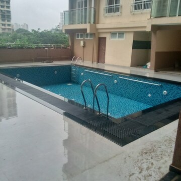 Swimming Pool in 2 BHK Apartment at Unnat Nagar CHS, Goregaon West – for Rent
