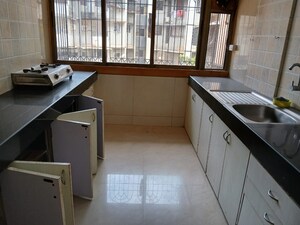 Kitchen in 2 BHK Apartment at Aashirwad Apartments, Andheri West – for Sale