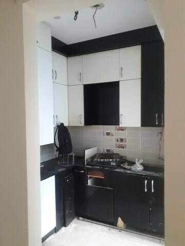 Kitchen in 2 BHK Apartment at Charms Castle, Raj Nagar Extension – for Rent