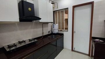 Kitchen in 2 BHK Apartment at Nirman Altius, Kharadi – for Rent