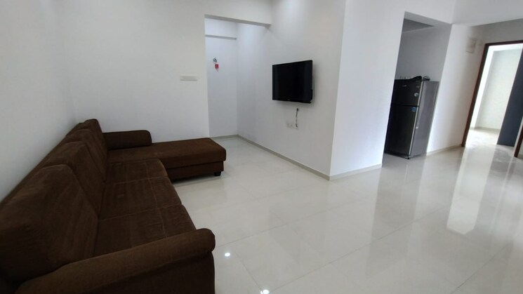 Living Room, nirman-altius 2 Bedroom 809 Sq.Ft. Apartment In Kharadi Pune 9151566